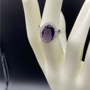 Sterling Silver amethyst prong set cocktail ring with gemstone halo bezel